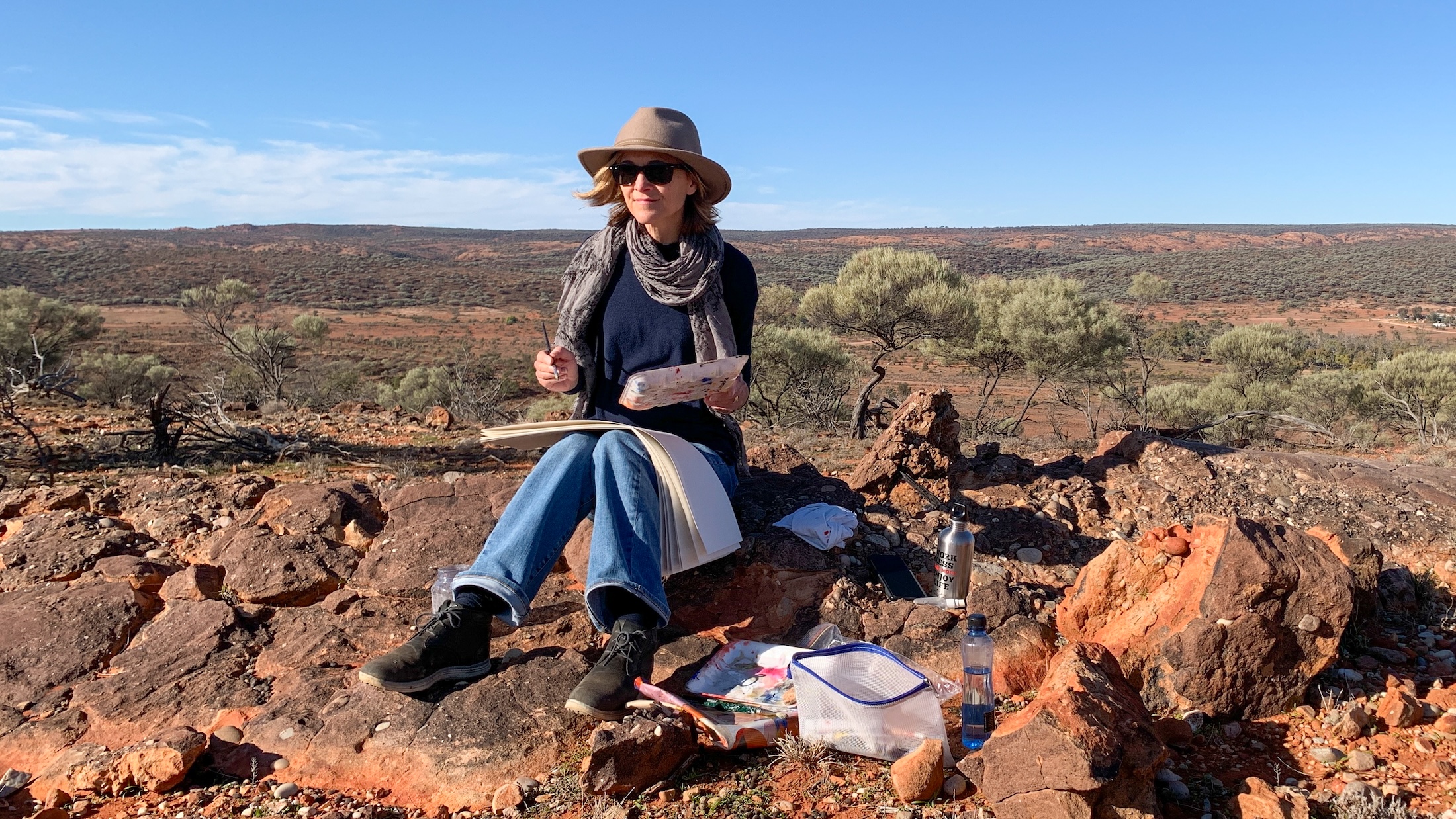 Robyn Pedley siting along the Western Ridge, Mutawintji National Park, NSW
