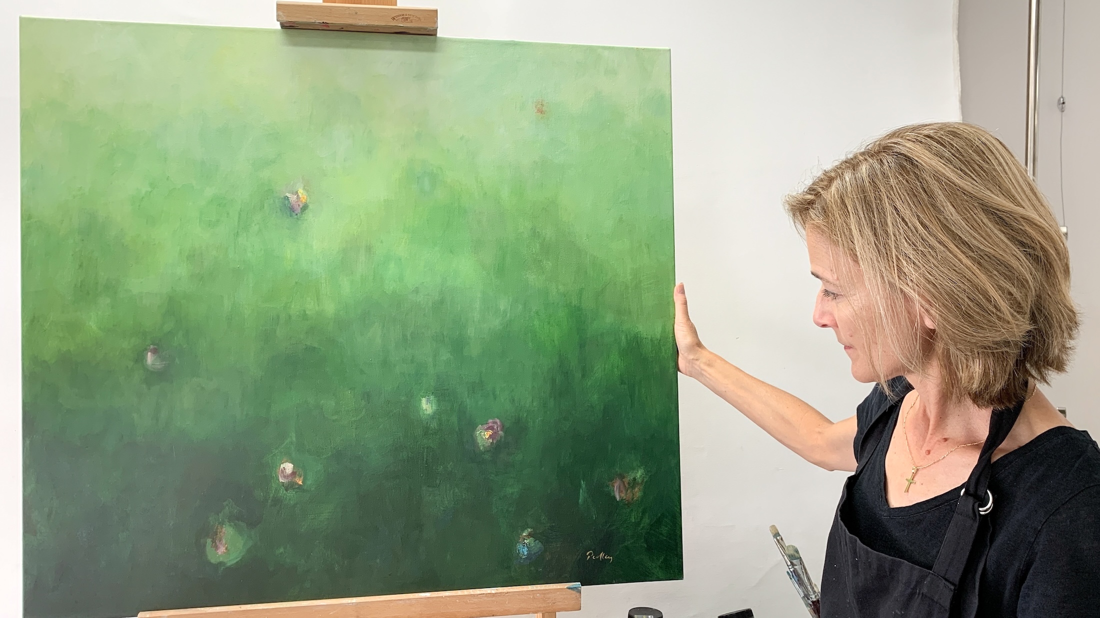 Robyn Pedley Artist working on draft canvas for client